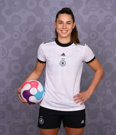 RHEDA-WIEDENBRUCK, GERMANY - APRIL 04: Lena Oberdorf of Germany poses for a portrait during the official UEFA Women's Euro 2022 portrait session  on April 04, 2022 in Rheda-Wiedenbruck, Germany. (Photo by Lukas Schulze - UEFA/UEFA via Getty Images)